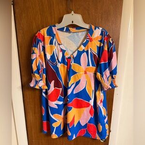 Size XL unbranded colorful floral print short sleeve top, gently used condition
